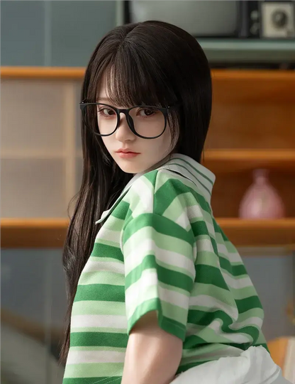 June, black-framed glasses, green stripe polo, white pleated skirt, brown Mary Jane leather shoes, turning her head back, side face profile, bust shot, very refreshing and first love vibes – girl next door sex doll by TopLoveDoll