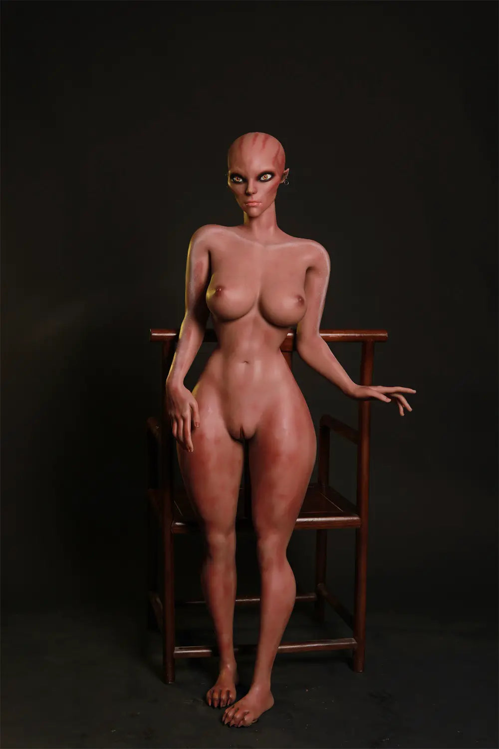 Full-length front view of unclothed Nyxie alien sex doll standing in front of a wooden chair