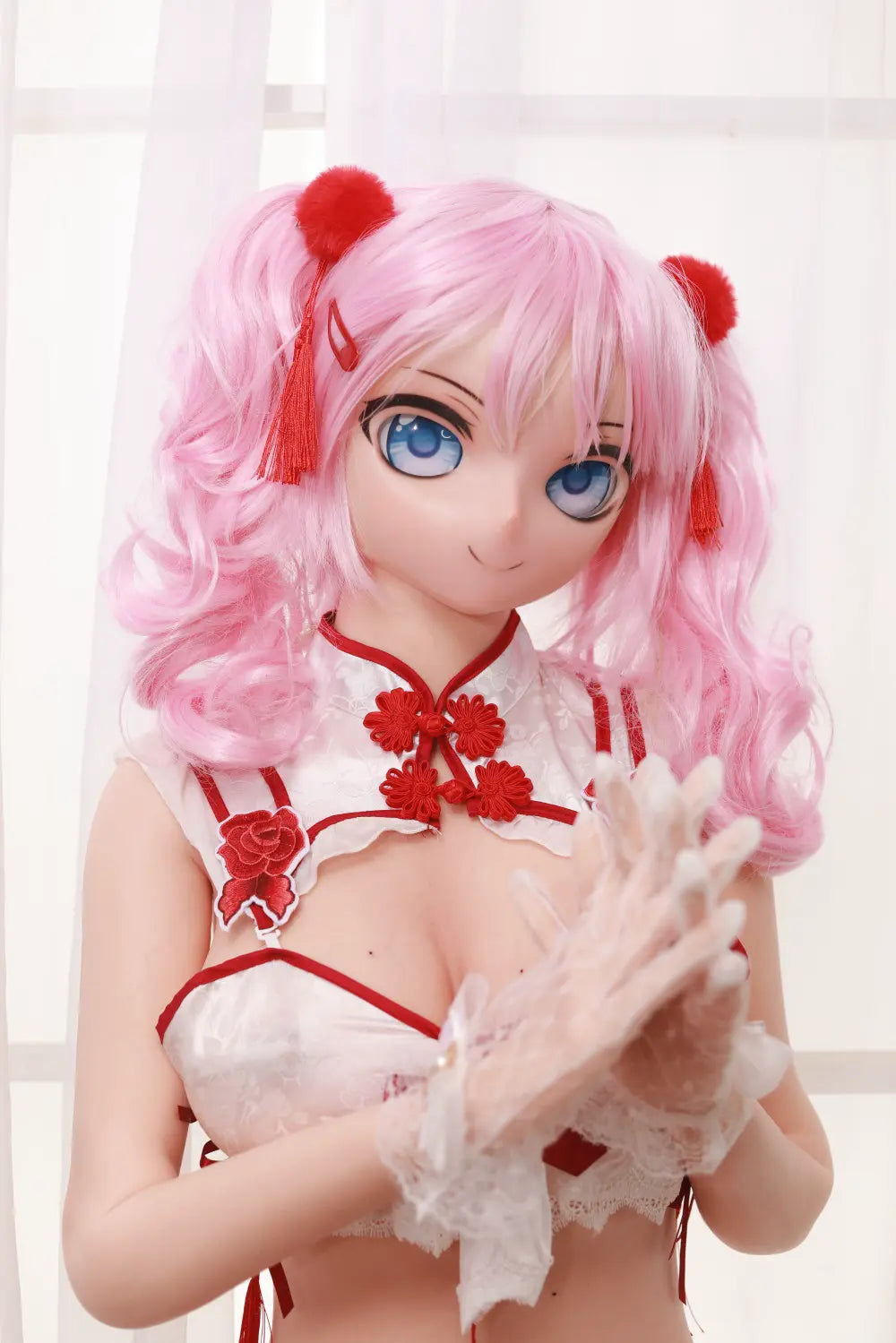Mirumi sex doll with arms crossed over a red-and-white costume