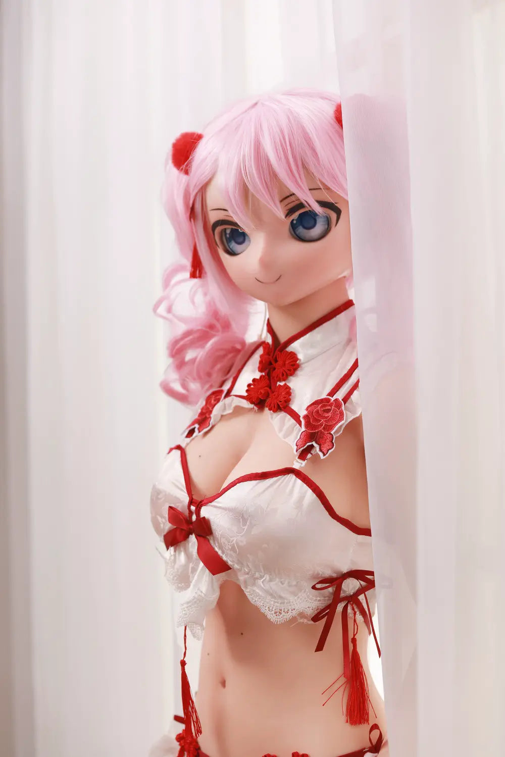 Side portrait of Mirumi sex doll with pink twin-tail hair