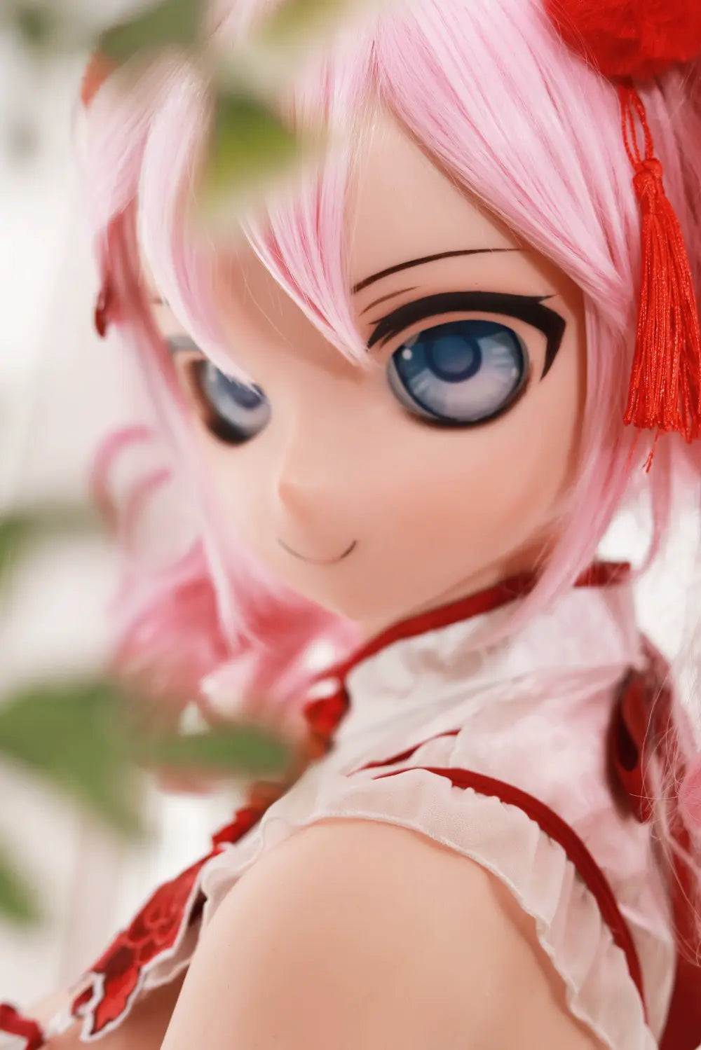 Close-up of Mirumi's large blue anime eyes and pink hair
