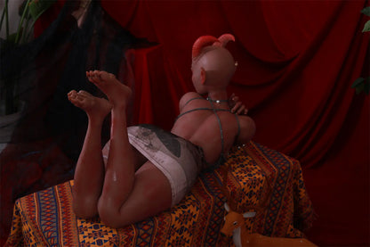Tauris sex doll seated with one knee raised and a hand resting beside the leg