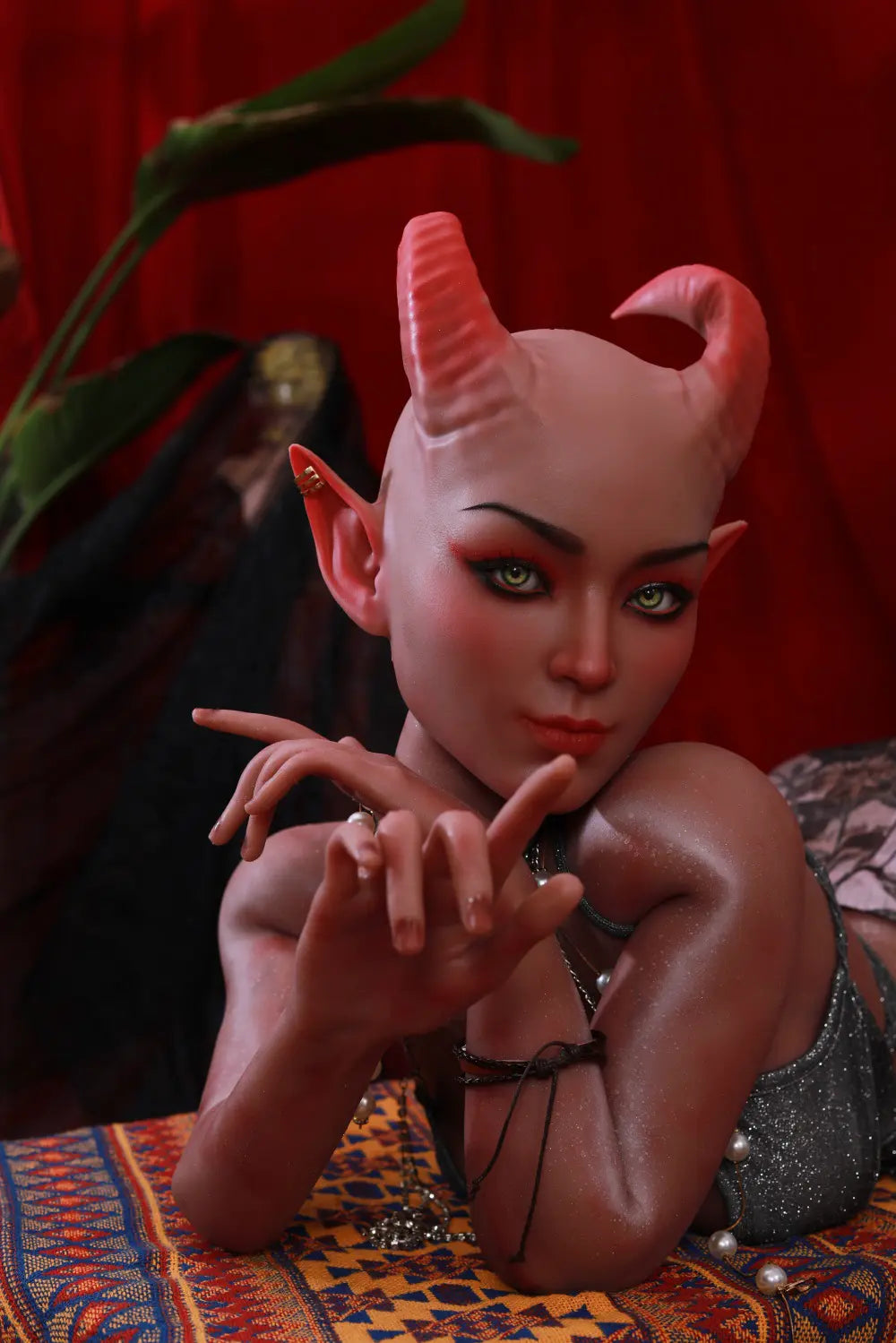 Three-quarter view of Tauris sex doll leaning on the platform with hands beside the chin