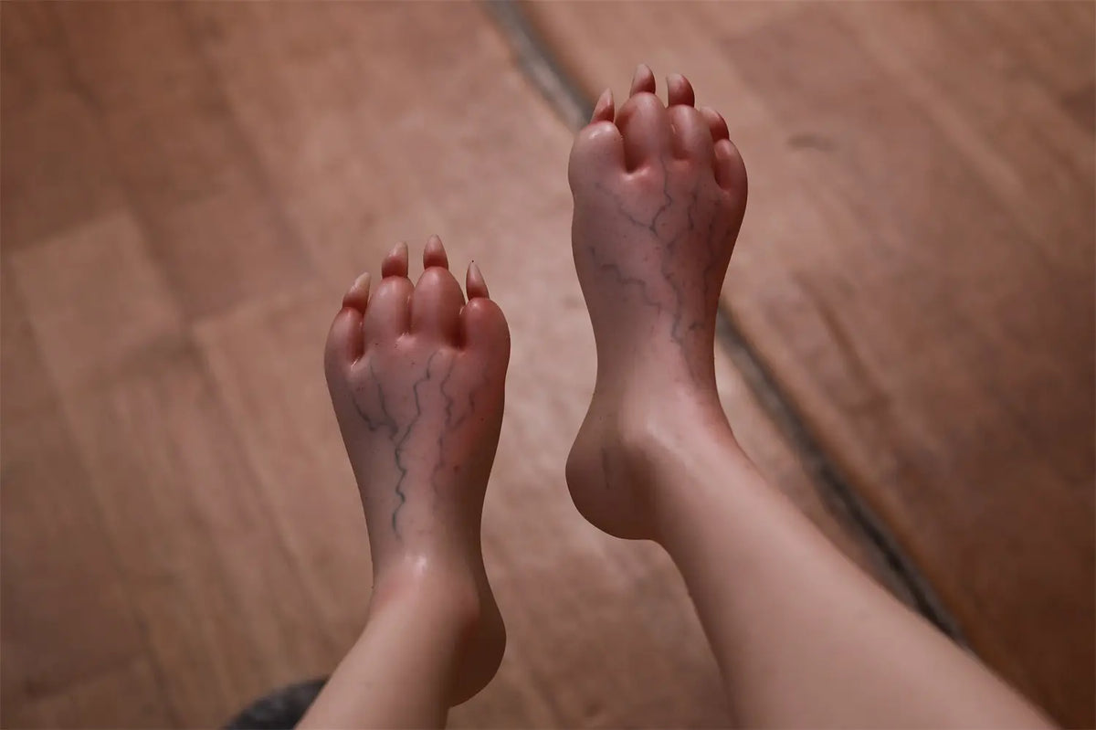Close-up of Veltris sex doll's beast-like feet with claw-shaped toes