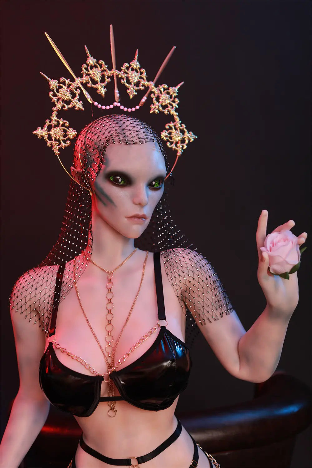 Aelyth alien sex doll standing with one hand raised beside the ornate headpiece
