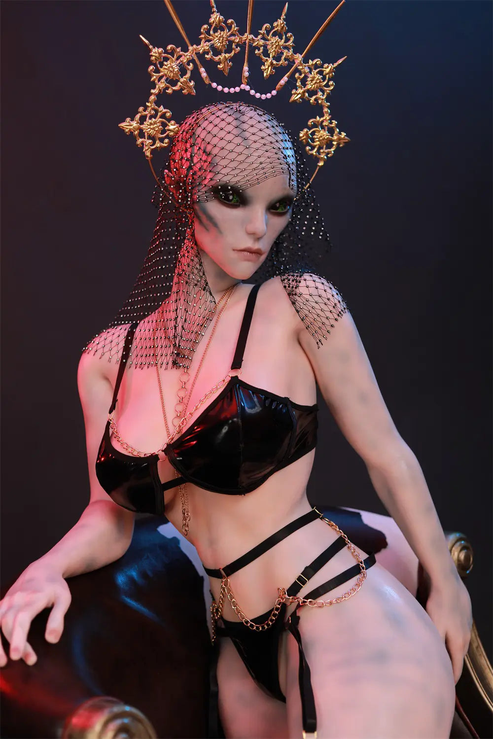 Side view of Aelyth sex doll kneeling on an armchair with one hand on the armrest