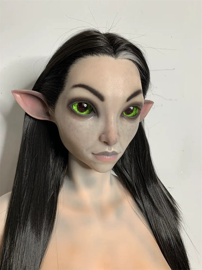 Front factory portrait of Kaeryn sex doll showing large green eyes, pointed elf ears and black hair
