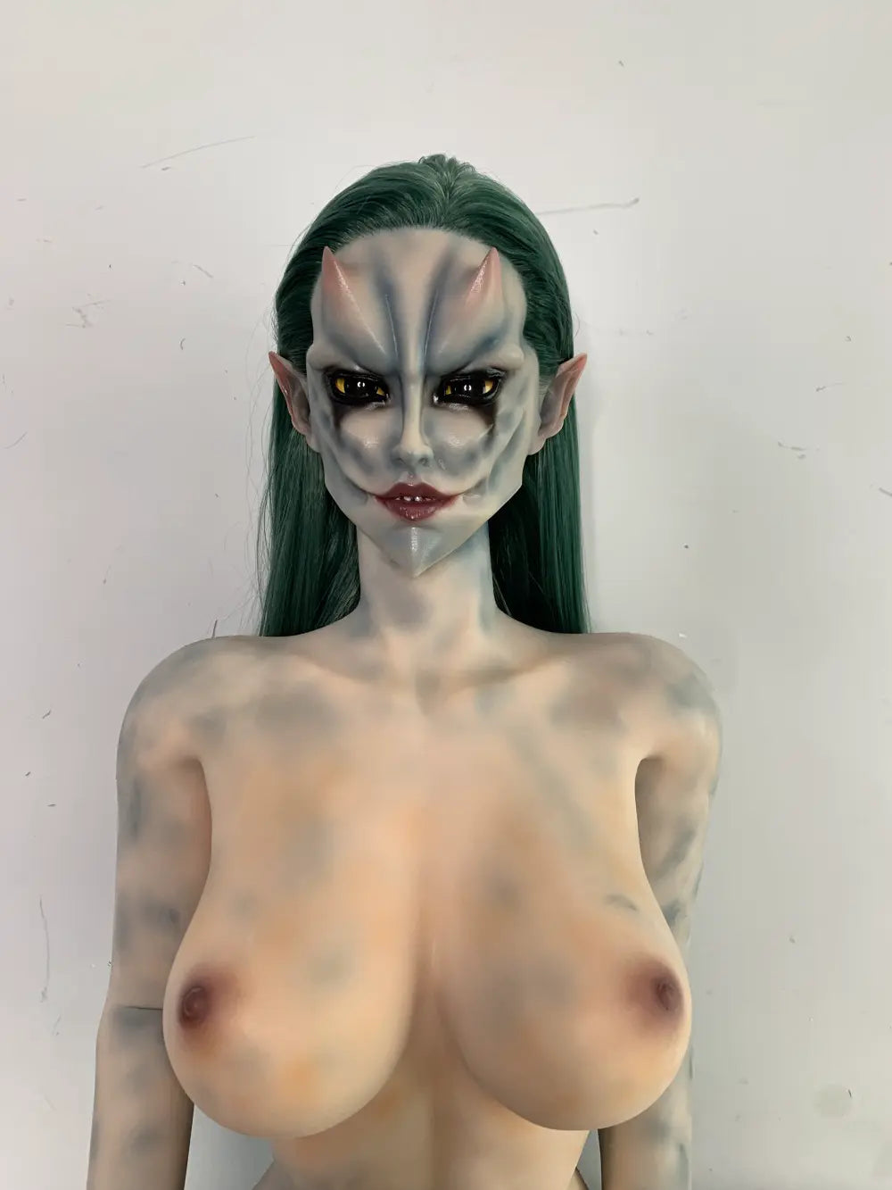 Front factory portrait of Morveth sex doll showing gray-toned facial details and dark eye surrounds
